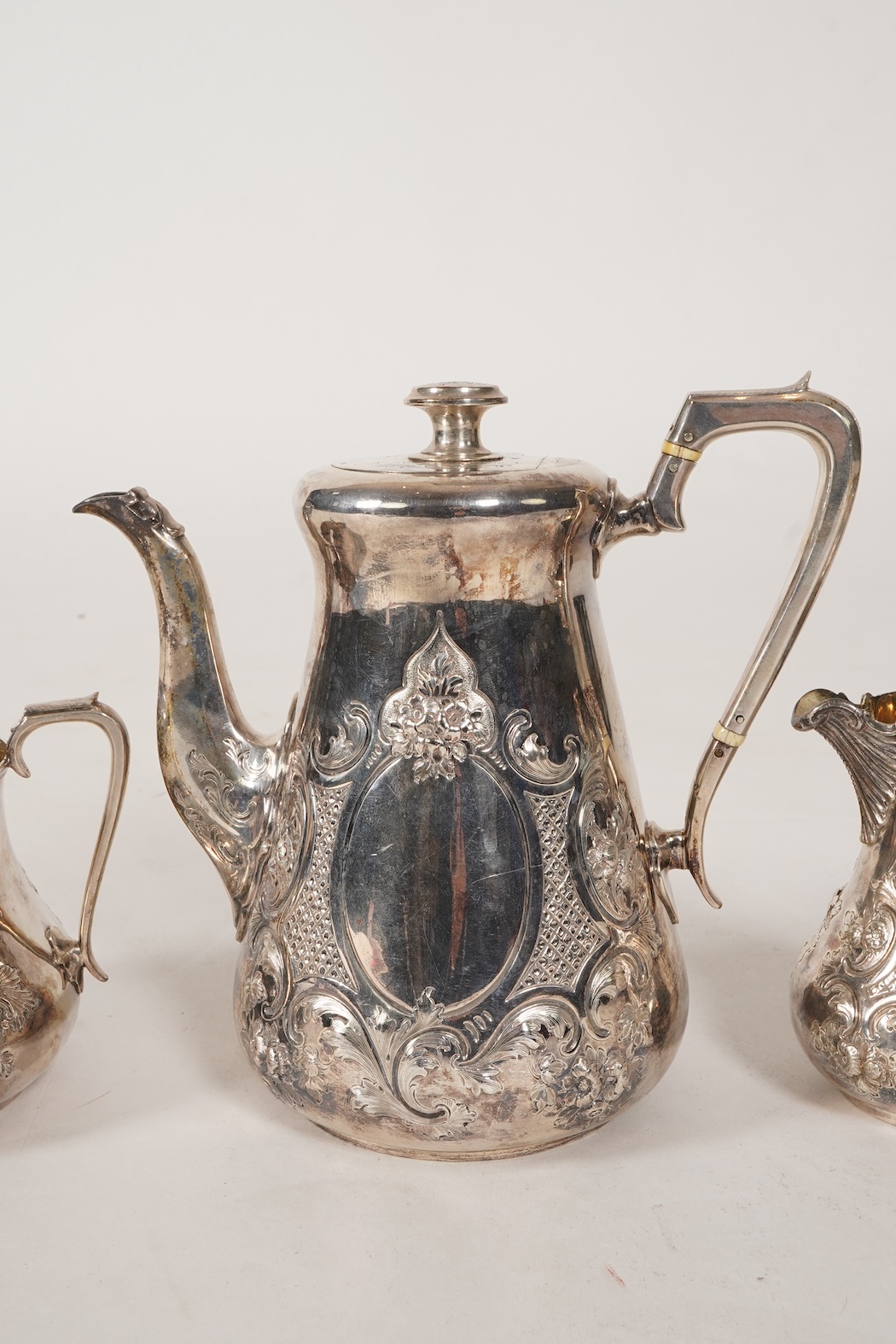 A Victorian embossed silver four piece tea and coffee service by Daniel & Charles Houle